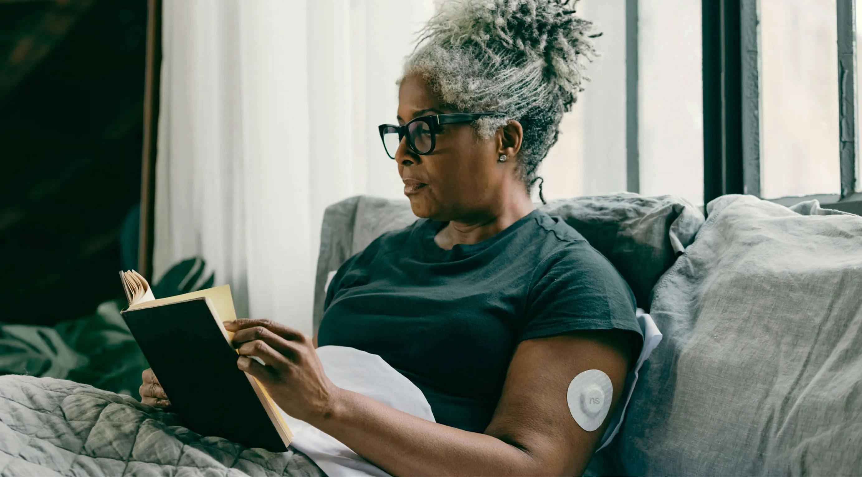 Women wearing CGM device What is CGM?